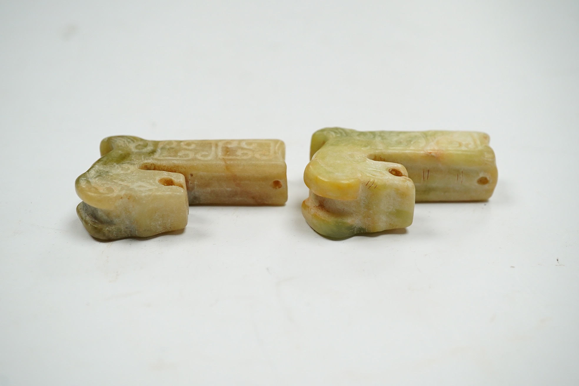 Two Chinese jade carvings in the form of animals, both 5cm high. Condition - good